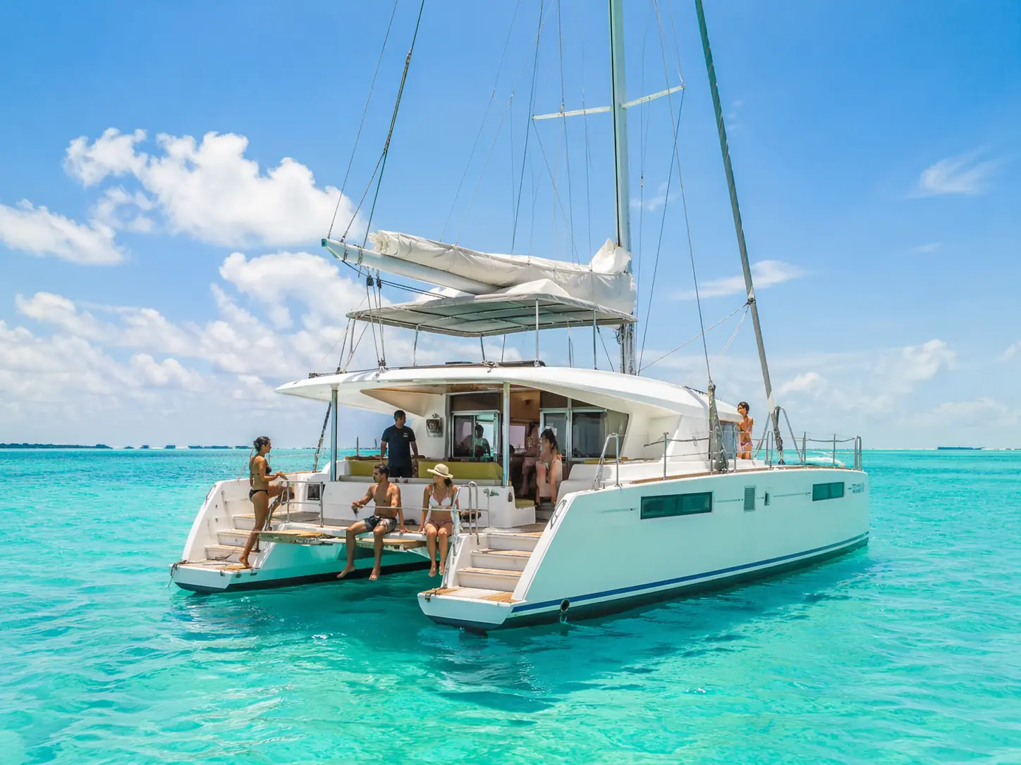 Catamaran sailing day on clear Caribbean water