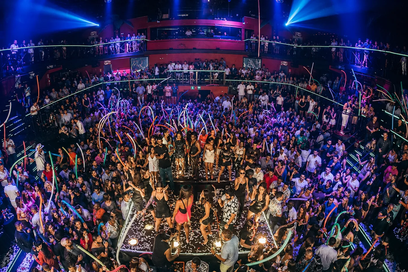 Coco Bongo show crowd with lights, confetti, and a packed audience